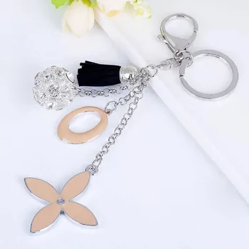 Kreatívne jednoduché four-leaf clover keychain kvety auto krúžok na ženské módne tašky krásne zdobené kúzlo kľúč