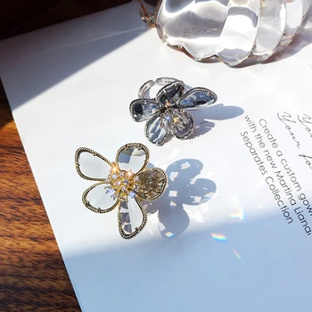 Nové módne šperky otvorenie vysoko kvalitnej medi vykladané krištáľové sklo kvet krúžok prehnané luxusný cocktail party krúžok pre ženy