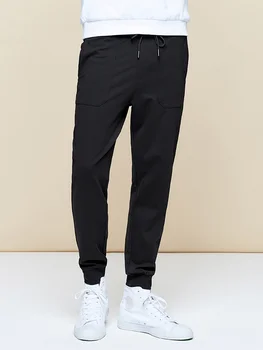 KUEGOU Mužov bežné nohavice mužov slim elastický úplet nohavice Black fashion lúč nohy športové nohavice KK-2969